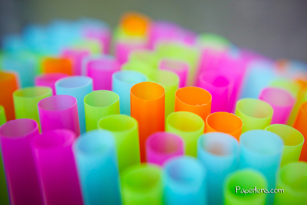 An up close picture of colorful, plastic straws
