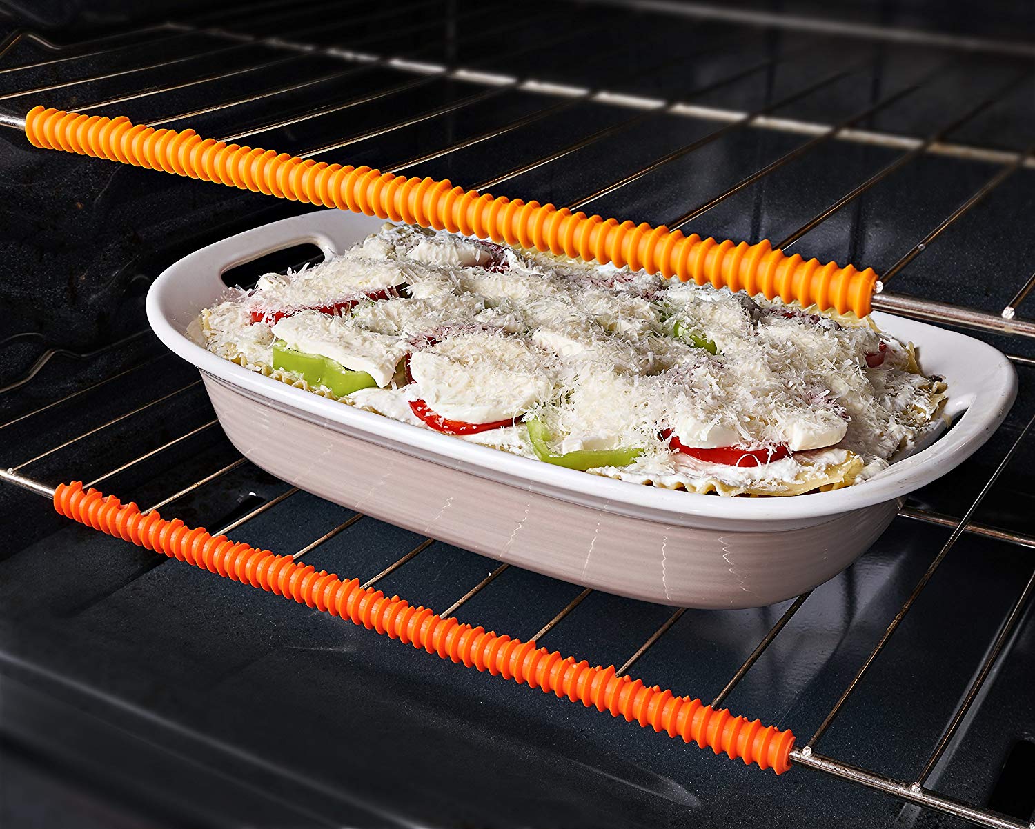 brightly colored silicone coils line the outfacing edge of oven racks with a casserole bubbling in the oven