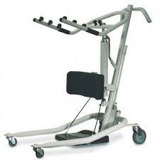 Standing frame with knee pads, handles with knobs for sling, and hydraulic hand pump