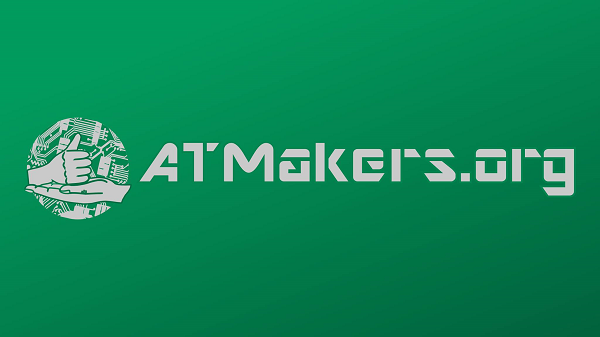 The ATMakers Logo, a forest green rectangle with ATMakers.org imprinted, and a circle with two hands, one palm up and the other a fist with the thumb pointing up. In the background of the circle are tools and circuit boards.