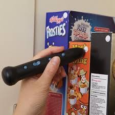 Pen friend being used to identify cereal boxes